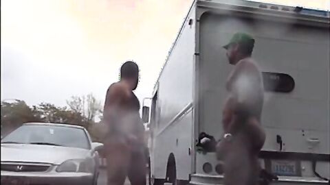 Public Rainy Stroking in a Parking Lot by Two Horny Men