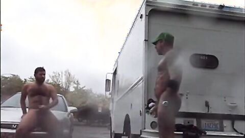 Public Rainy Stroking in a Parking Lot by Two Horny Men