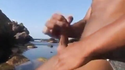 Arab Twink Strokes His Big Dick Outdoors by the Beach