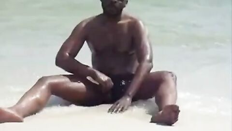 Black Amateur Strokes His Big Cock Outdoors at the Beach