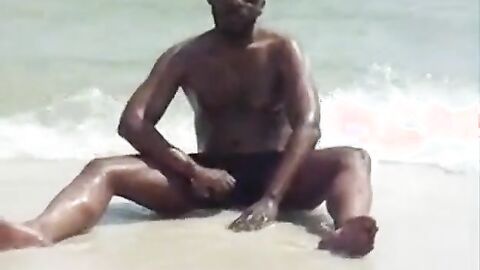 Black Amateur Strokes His Big Cock Outdoors at the Beach