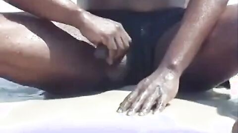 Black Amateur Strokes His Big Cock Outdoors at the Beach