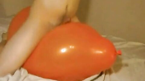 Twink Humping and Cumming on an Inflatable Orange Balloon