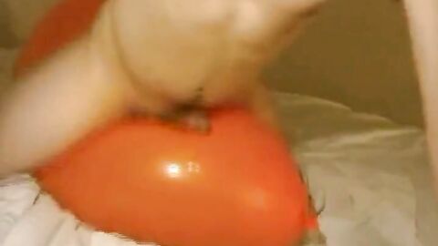 Twink Humping and Cumming on an Inflatable Orange Balloon