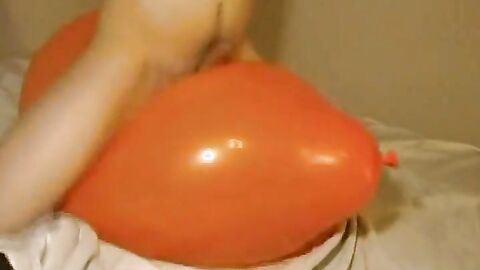 Twink Humping and Cumming on an Inflatable Orange Balloon