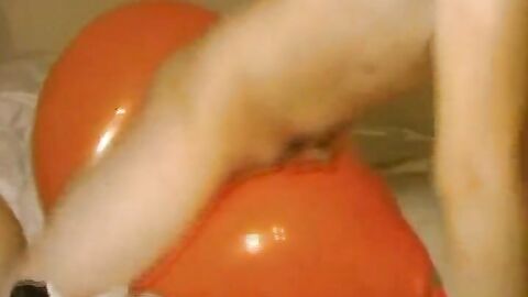 Twink Humping and Cumming on an Inflatable Orange Balloon