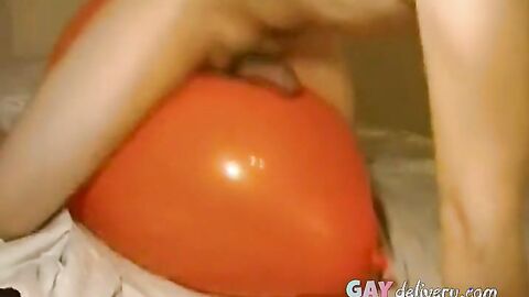 Twink Humping and Cumming on an Inflatable Orange Balloon