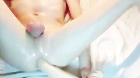 Oiled Twink Masturbates with a Giant Dildo
