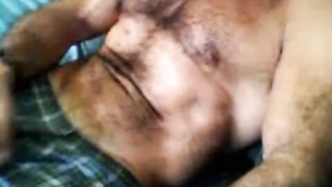 Bearded daddy strokes his cock solo