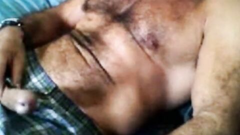 Bearded daddy strokes his cock solo