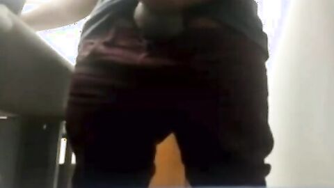 Brazilian Daddy Strokes His Big Uncut Cock at Work