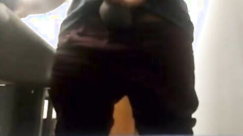 Brazilian Daddy Strokes His Big Uncut Cock at Work