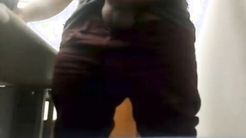 Brazilian Daddy Strokes His Big Uncut Cock at Work