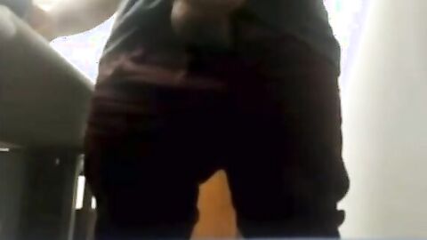 Brazilian Daddy Strokes His Big Uncut Cock at Work