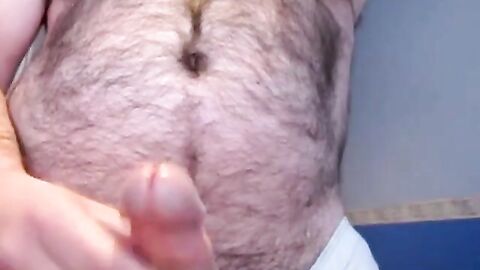 Hairy Bear Strokes His Big Dick