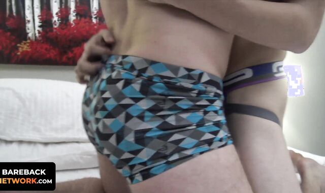 Logan Carter lifts JJ Thorne's legs before plunging his shaft into his tight boy hole