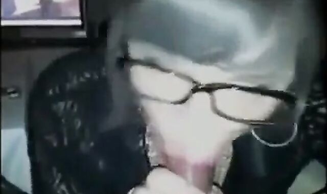 Crossdressing Secretary Gives Amateur Blowjob on Webcam