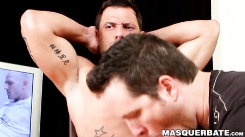 Buff stud vigorously masturbates after partner sucks him off