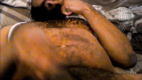 Hairy Black Man Jerks Off, Showing Off His Chest and Belly