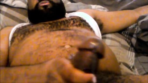 Hairy Black Man Jerks Off, Showing Off His Chest and Belly
