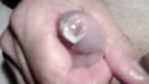 Twink's Webcam Handjob: Small Cock, Big Condom Fun