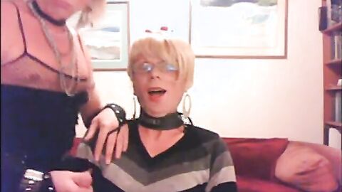 Clothed Crossdressers Suck Each Other Off