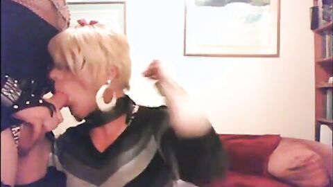 Clothed Crossdressers Suck Each Other Off