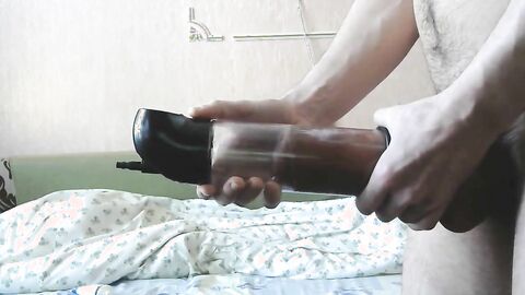 Vacuum Pumping a Big Cock on Webcam