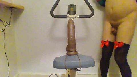 Sissy Rides Dildo on a Bike