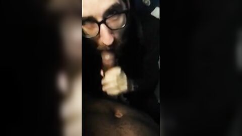Bearded Guy Sucks Interracial Cock in a Public Restroom