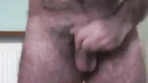 Hairy Daddy Strokes His Cock