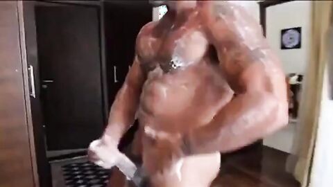 Muscle hunks stroke their big cocks and cum hard.