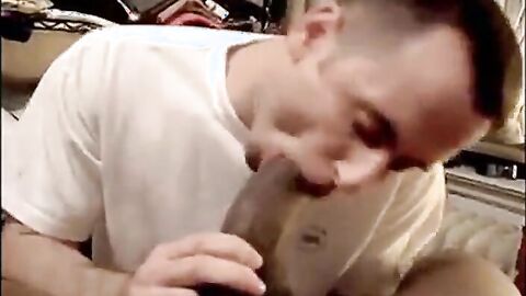 Muscular Amateur Sucks a Huge Black Cock