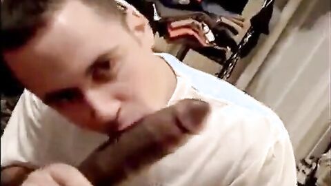 Muscular Amateur Sucks a Huge Black Cock