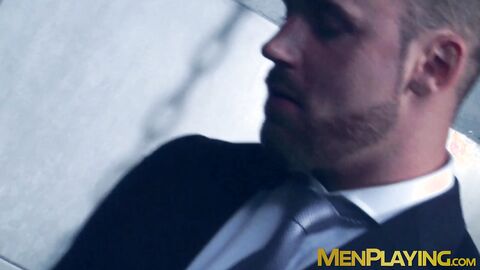 Leather clad Dato Foland pounds the warm ass hole of suited Logan Moore