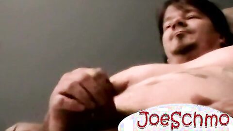 Big muscular hunk jerks off his enormous cock