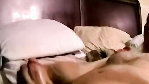 Hairy dude plays with his big dick hard
