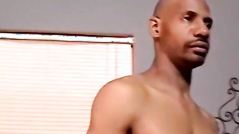 Athletic black stud receives blowjob from mature homosexual