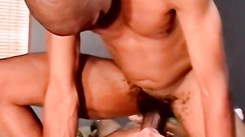 Athletic black stud receives blowjob from mature homosexual