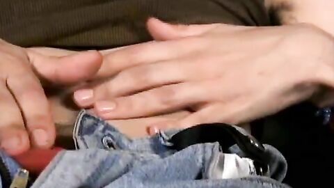Slim twink tugs on his throbbing dick in this classic video