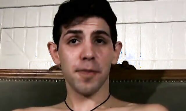 Slim twink tugs on his throbbing dick in this classic video