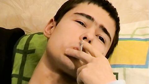 Young Marivelli hops on the couch and starts his smoking and jerking session