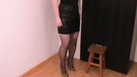Crossdresser in Corset and Stockings