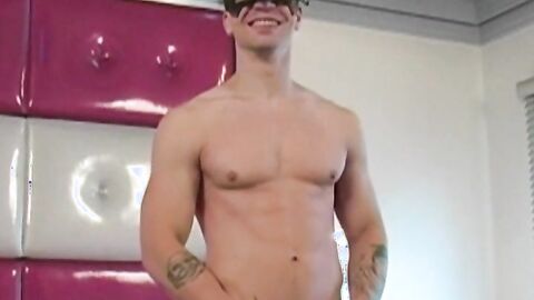 Masked athletic stud Troy does an interview before jerking