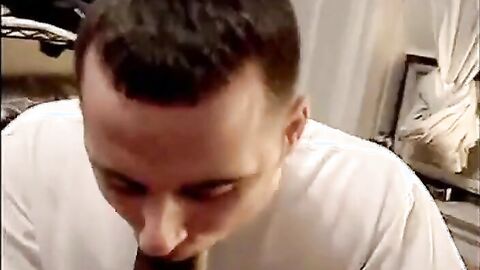 Muscular Amateur Sucks a Huge Black Cock