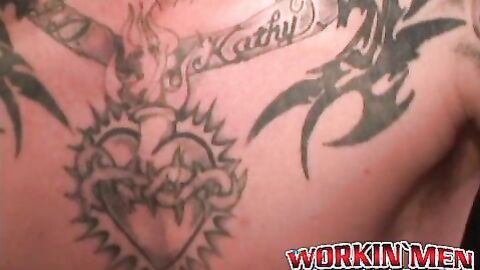Seductive tattooed hunk jerks off while moaning in hot solo
