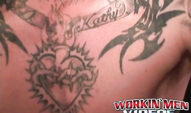 Seductive tattooed hunk jerks off while moaning in hot solo