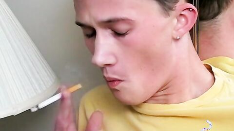 Cute chainsmoker stroke his cock as he blows smoke clouds