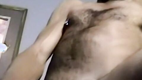 Black amateur strips and masturbates into an intense orgasm