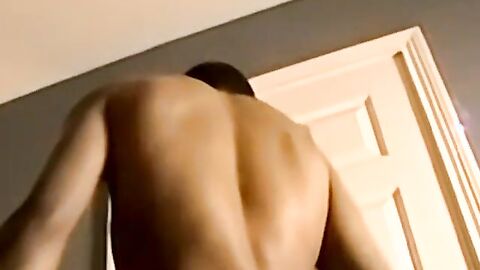 Black amateur strips and masturbates into an intense orgasm